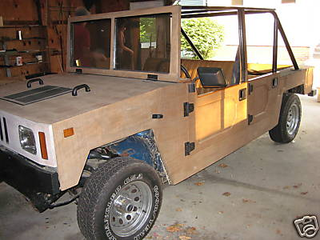 Illustration for article titled "Happy Jack" Wooden Hummer Replica A Questionable Off-Roader